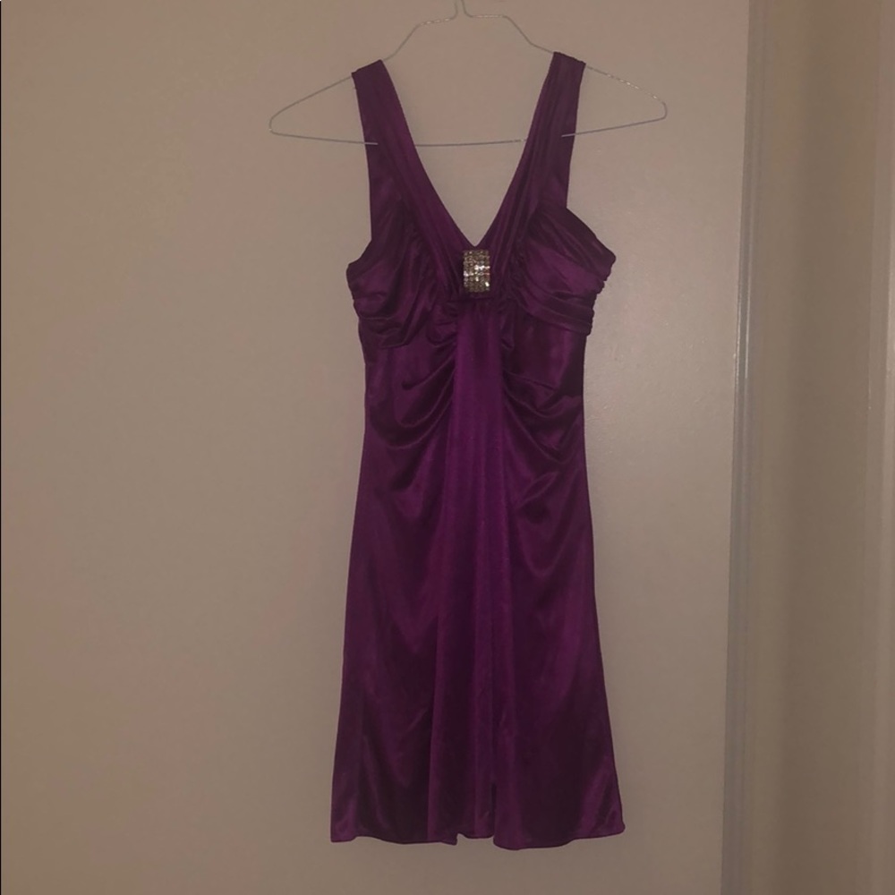 Magenta mid length formal dress.